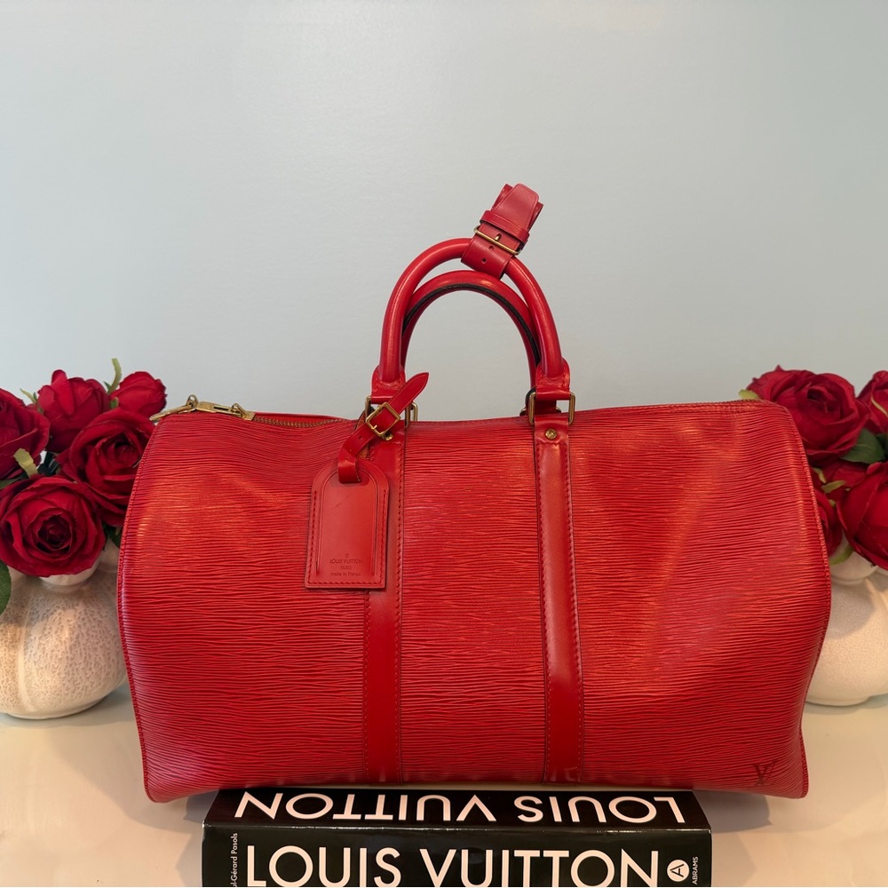 Louis Vuitton Keepall travel bag, Cherry Red Epi Leather